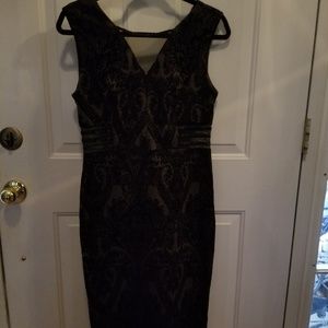 Black knee-length dress